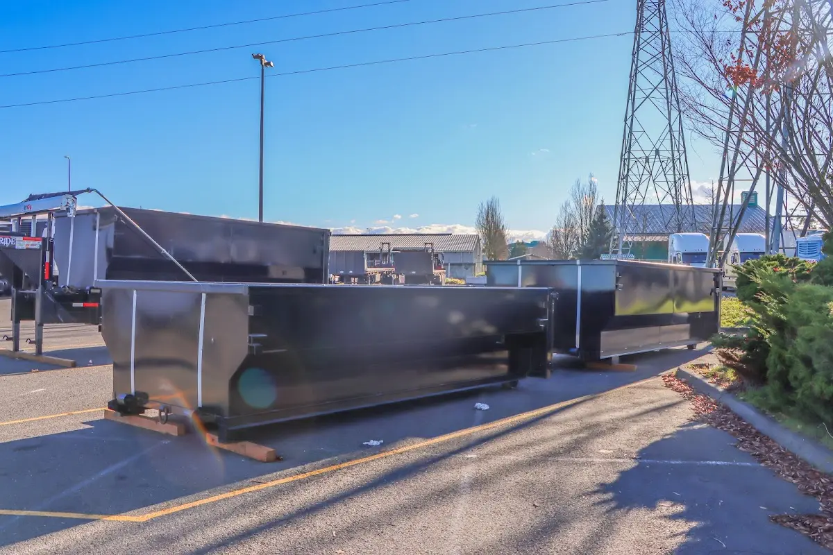 Roll-off dumpster ready for waste disposal at job site for 12 Yard Dumpster Rental in Braddock